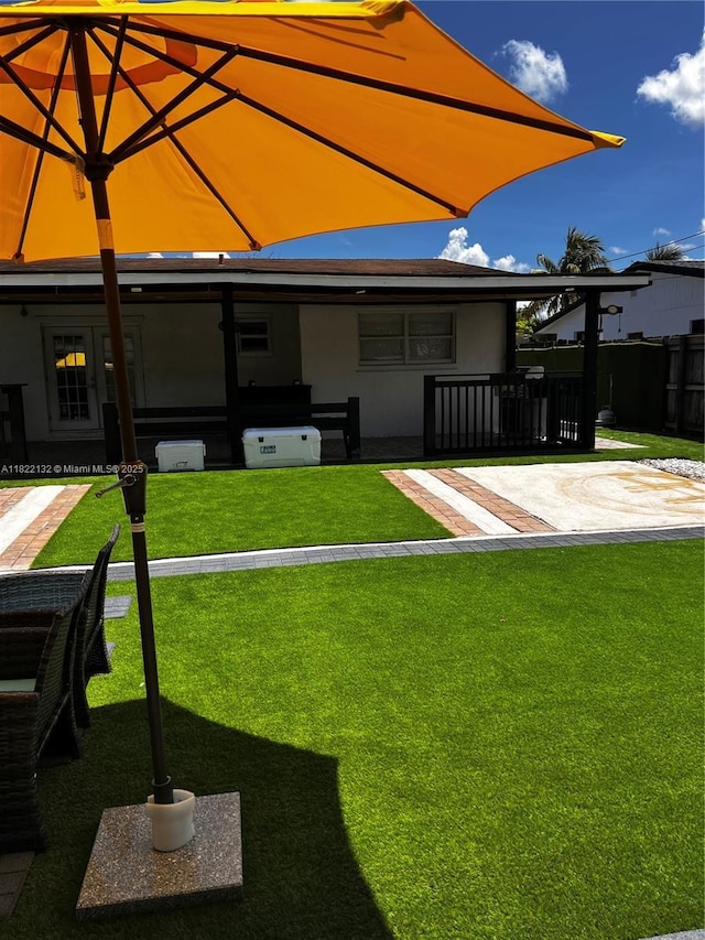 7151 Pershing St, Hollywood, FL 33024 - back of house featuring stucco siding and a patio