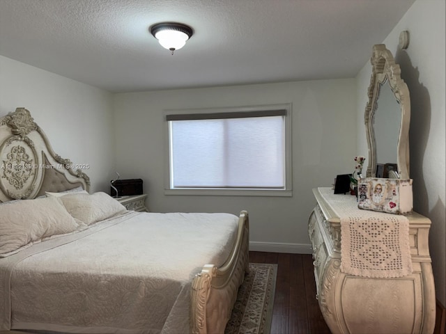 15400 SW 284th St Unit 1308, Homestead, FL 33033 - bedroom featuring dark wood-style floors and a textured ceiling