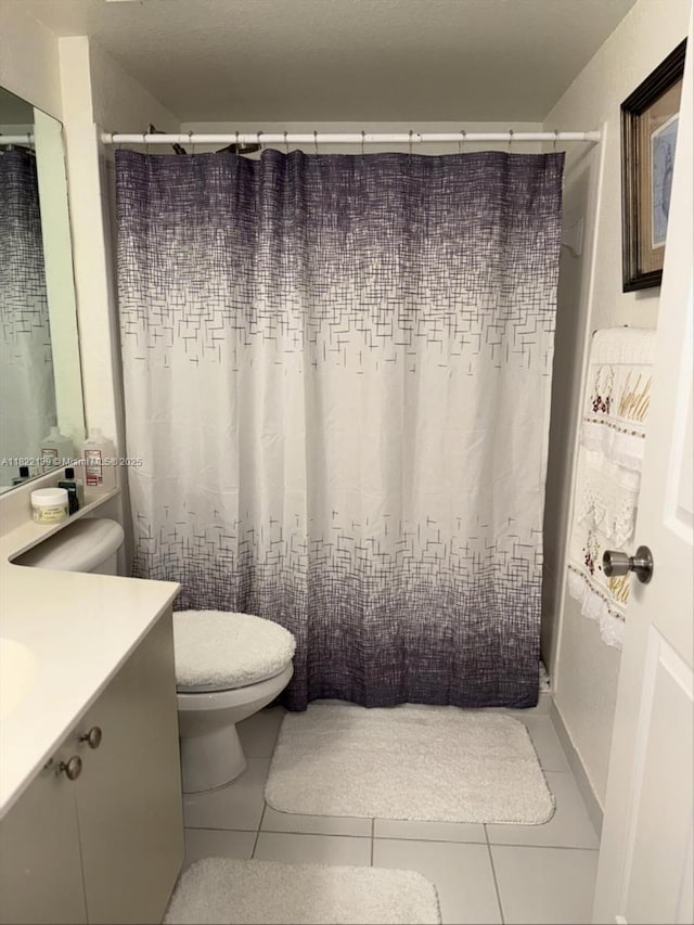 15400 SW 284th St Unit 1308, Homestead, FL 33033 - bathroom with vanity, tile patterned floors, and curtained shower