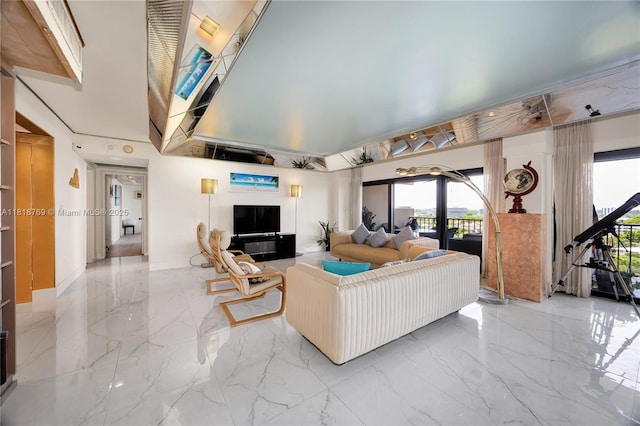 1800 NE 114th St Unit 1103, Miami, FL 33181 - living room with light marble finish flooring and french doors
