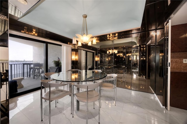 1800 NE 114th St Unit 1103, Miami, FL 33181 - dining area featuring a chandelier and marble tiled flooring