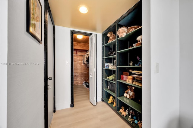 1800 NE 114th St Unit 1103, Miami, FL 33181 - corridor featuring light wood-style floors and wood walls