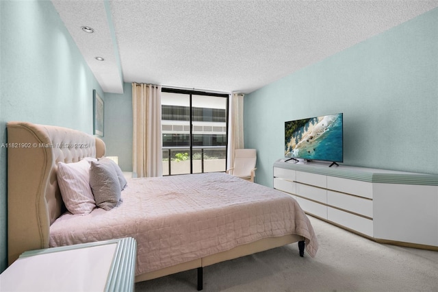 9455 Collins Ave Unit 305, Surfside, FL 33154 - carpeted bedroom featuring a textured ceiling