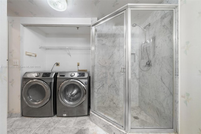 9455 Collins Ave Unit 305, Surfside, FL 33154 - washroom with separate washer and dryer and marble look tile flooring