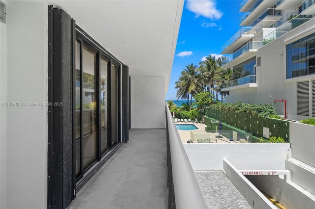 9455 Collins Ave Unit 305, Surfside, FL 33154 - balcony featuring view of pool