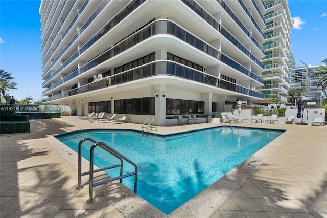 9455 Collins Ave Unit 305, Surfside, FL 33154 - community pool with a patio