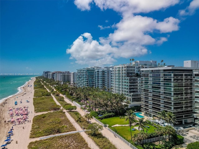 9455 Collins Ave Unit 305, Surfside, FL 33154 - drone / aerial view of unending shoreline and apartment complex