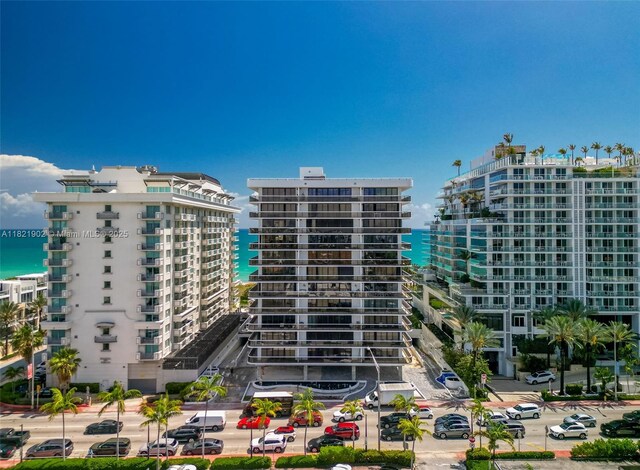 9455 Collins Ave Unit 305, Surfside, FL 33154 - view of apartment building / complex with a water view and a city view