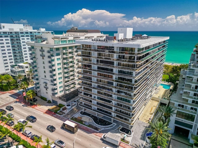 9455 Collins Ave Unit 305, Surfside, FL 33154 - view of apartment building / complex featuring a water view and a city view