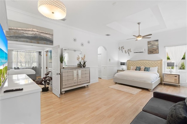 16601 SW 87th Ct, Palmetto Bay, FL 33157 - bedroom with ornamental molding, multiple windows, light wood-type flooring, arched walkways, and a ceiling fan