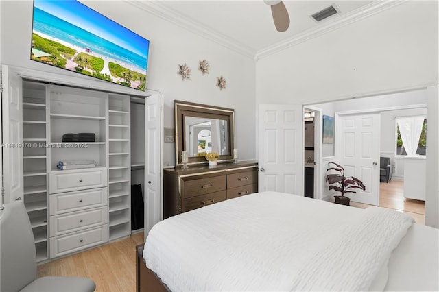 16601 SW 87th Ct, Palmetto Bay, FL 33157 - bedroom with ornamental molding and light wood-style flooring