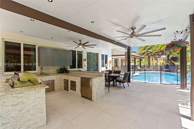 16601 SW 87th Ct, Palmetto Bay, FL 33157 - view of patio featuring an outdoor kitchen and ceiling fan