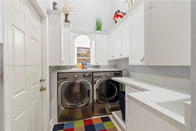 16601 SW 87th Ct, Palmetto Bay, FL 33157 - laundry room featuring washing machine and clothes dryer and cabinet space