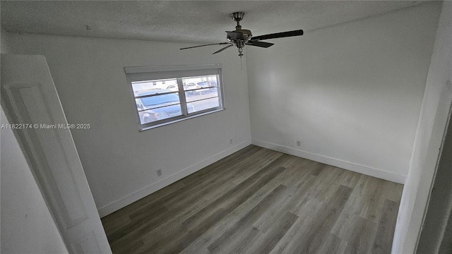608 NE 2nd St Unit 133, Dania Beach, FL 33004 - unfurnished room featuring wood finished floors, ceiling fan, and a textured ceiling
