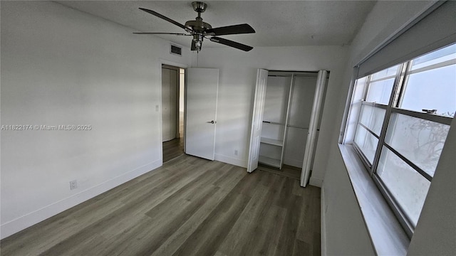 608 NE 2nd St Unit 133, Dania Beach, FL 33004 - unfurnished bedroom featuring wood finished floors, a closet, and ceiling fan