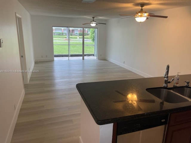 608 NE 2nd St Unit 133, Dania Beach, FL 33004 - kitchen featuring dishwasher, open floor plan, light wood-type flooring, and ceiling fan