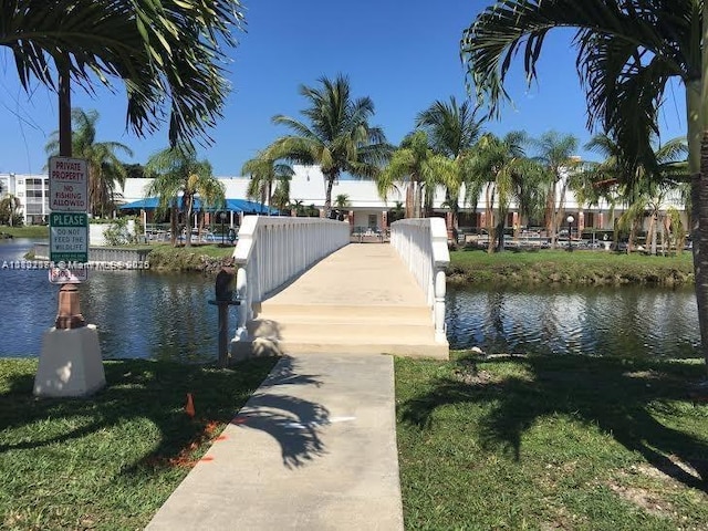 608 NE 2nd St Unit 133, Dania Beach, FL 33004 - dock area featuring a water view