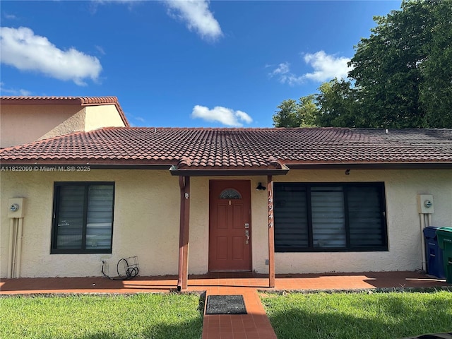 14944 SW 88th Ter, Miami, FL 33196 - view of front of property featuring stucco siding and a tile roof