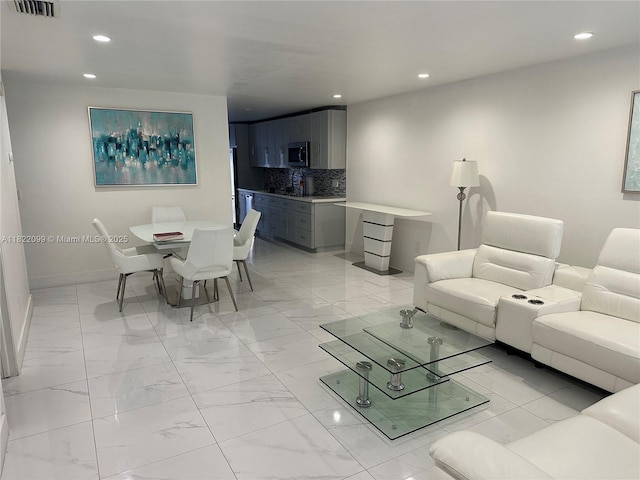 14944 SW 88th Ter, Miami, FL 33196 - living area featuring light marble finish flooring and recessed lighting