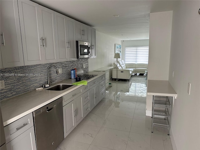 14944 SW 88th Ter, Miami, FL 33196 - kitchen with appliances with stainless steel finishes, light marble finish flooring, light countertops, decorative backsplash, and open floor plan