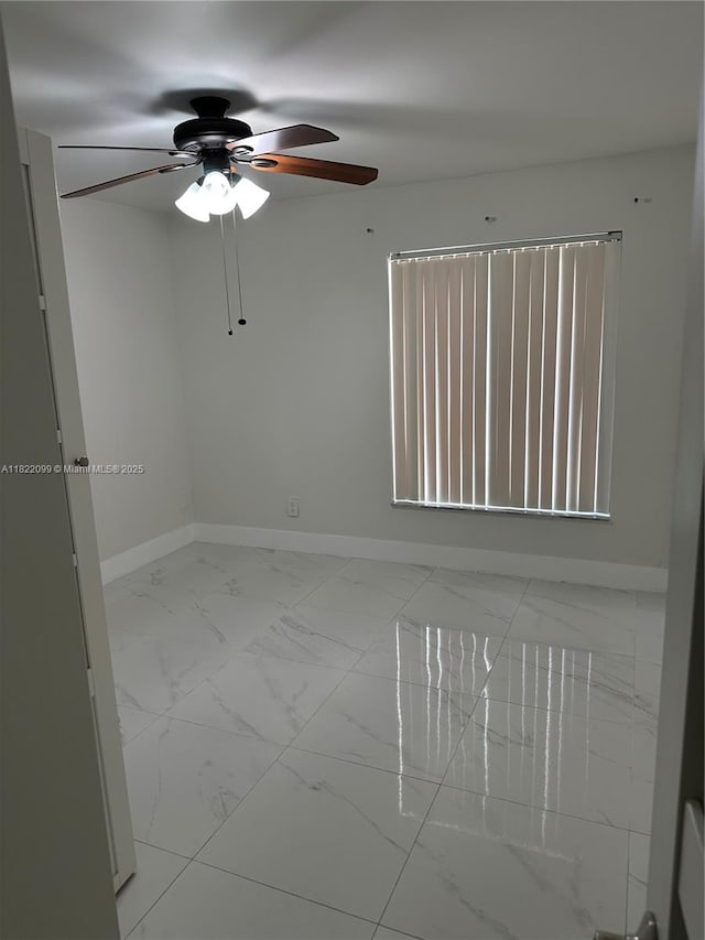 14944 SW 88th Ter, Miami, FL 33196 - unfurnished room featuring marble finish floors and ceiling fan