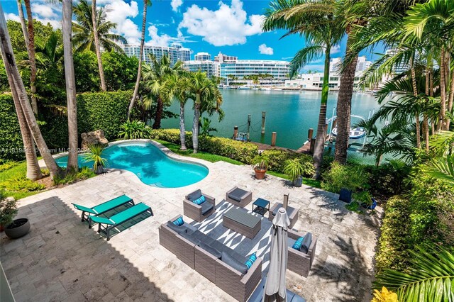 6535 Allison Rd, Miami Beach, FL 33141 - outdoor pool with a patio and a water view