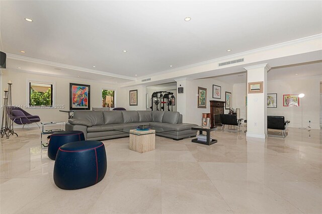 6535 Allison Rd, Miami Beach, FL 33141 - living area featuring ornamental molding, recessed lighting, decorative columns, and light marble finish flooring