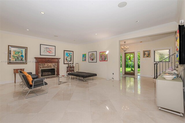 6535 Allison Rd, Miami Beach, FL 33141 - living room with ornamental molding, a chandelier, a fireplace, stairs, and light marble finish flooring