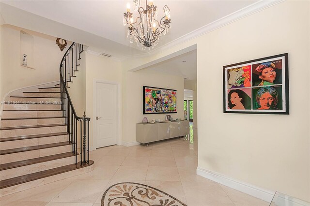 6535 Allison Rd, Miami Beach, FL 33141 - entrance foyer featuring stairway, a chandelier, tile patterned floors, and ornamental molding