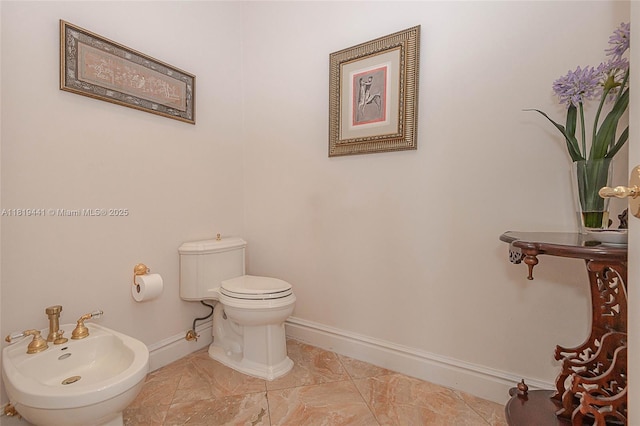 6535 Allison Rd, Miami Beach, FL 33141 - half bath with a bidet and baseboards