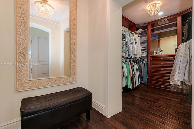 6535 Allison Rd, Miami Beach, FL 33141 - spacious closet with hardwood / wood-style flooring and arched walkways