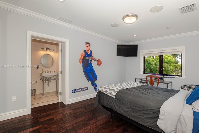 6535 Allison Rd, Miami Beach, FL 33141 - bedroom with ornamental molding, hardwood / wood-style flooring, recessed lighting, and ensuite bathroom