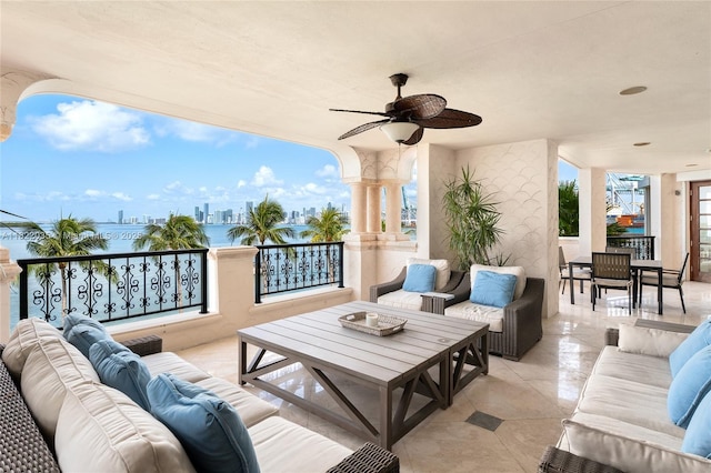 5233 Fisher Island Dr Unit 5233, Miami Beach, FL 33109 - view of patio with outdoor lounge area, a ceiling fan, and a city view