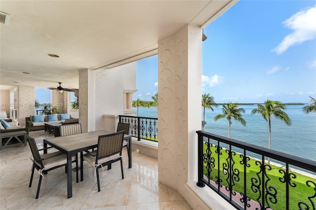 5233 Fisher Island Dr Unit 5233, Miami Beach, FL 33109 - balcony featuring a water view, an outdoor hangout area, and a ceiling fan