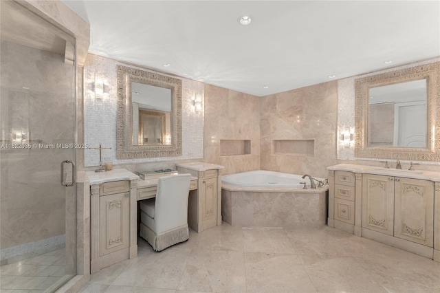 5233 Fisher Island Dr Unit 5233, Miami Beach, FL 33109 - bathroom with a garden tub, a shower stall, vanity, tile walls, and recessed lighting