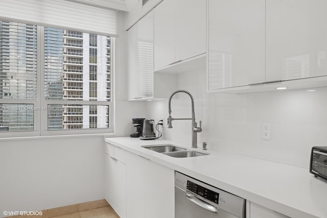 801 Brickell Key Blvd Unit 2202, Miami, FL 33131 - kitchen featuring stainless steel dishwasher, white cabinets, modern cabinets, light countertops, and light tile patterned floors