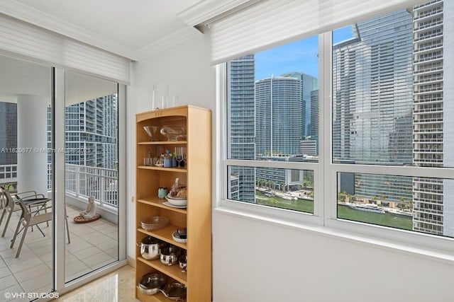 801 Brickell Key Blvd Unit 2202, Miami, FL 33131 - interior space with tile patterned floors, crown molding, and a view of city