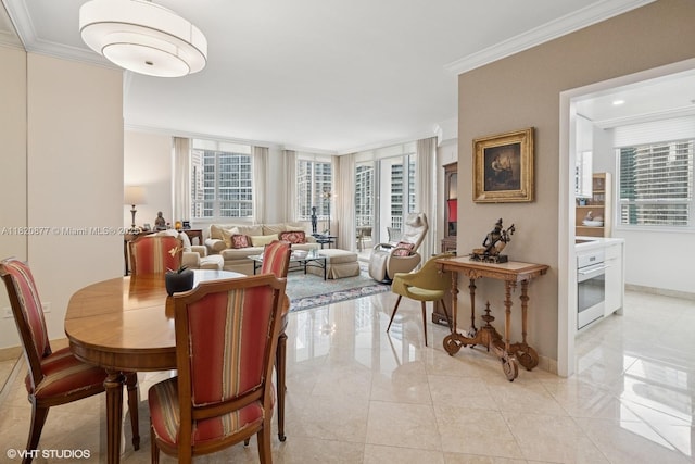801 Brickell Key Blvd Unit 2202, Miami, FL 33131 - dining area featuring ornamental molding