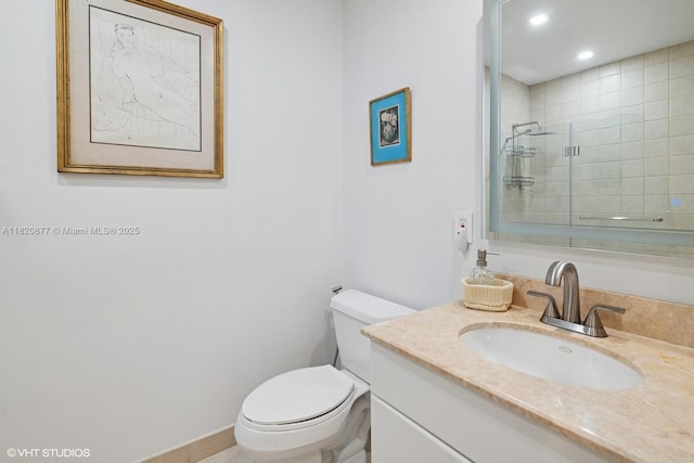 801 Brickell Key Blvd Unit 2202, Miami, FL 33131 - bathroom featuring vanity, tiled shower, and recessed lighting