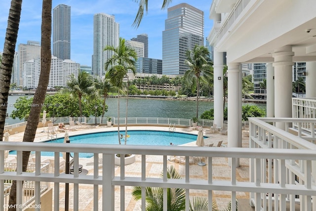 801 Brickell Key Blvd Unit 2202, Miami, FL 33131 - community pool featuring a water view, a skyline view, and a patio