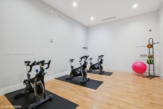 801 Brickell Key Blvd Unit 2202, Miami, FL 33131 - exercise area with wood finished floors and recessed lighting