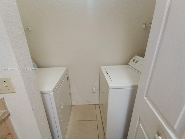 503 Belmont Ln Unit 503, North Lauderdale, FL 33068 - laundry room featuring light tile patterned flooring and washing machine and clothes dryer