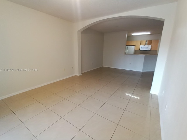 503 Belmont Ln Unit 503, North Lauderdale, FL 33068 - unfurnished room featuring light tile patterned floors and arched walkways