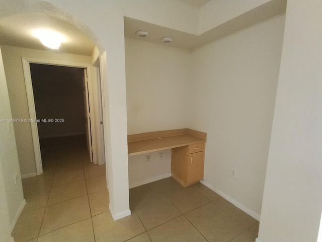503 Belmont Ln Unit 503, North Lauderdale, FL 33068 - unfurnished office with light tile patterned floors and arched walkways
