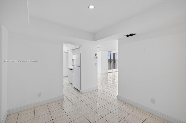 2851 NE 183rd St Unit 216E, Aventura, FL 33160 - spare room featuring light tile patterned floors and recessed lighting
