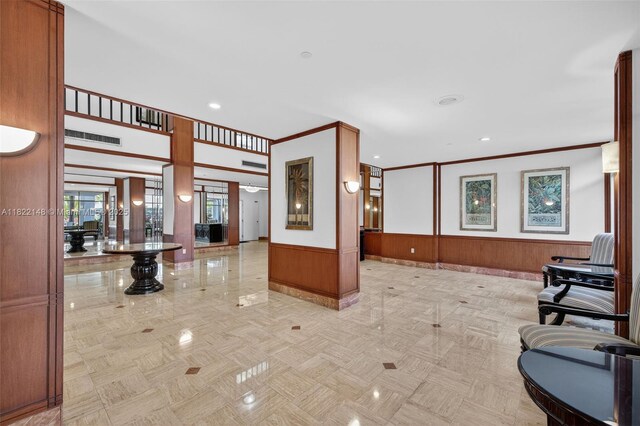 2851 NE 183rd St Unit 216E, Aventura, FL 33160 - community lobby with ornamental molding, wainscoting, and recessed lighting
