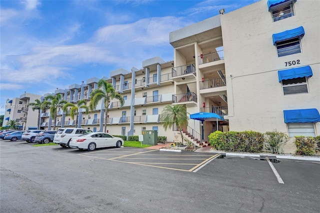7502 NW 30th Pl Unit 112, Sunrise, FL 33313 - view of apartment building / complex with uncovered parking
