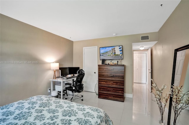 7502 NW 30th Pl Unit 112, Sunrise, FL 33313 - bedroom featuring light tile patterned floors and an office area