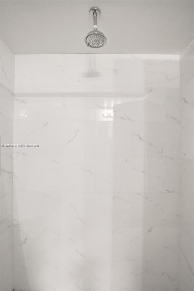 7502 NW 30th Pl Unit 112, Sunrise, FL 33313 - bathroom view of a marble finish shower