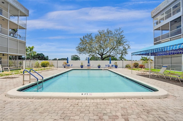 7502 NW 30th Pl Unit 112, Sunrise, FL 33313 - community pool featuring a patio area